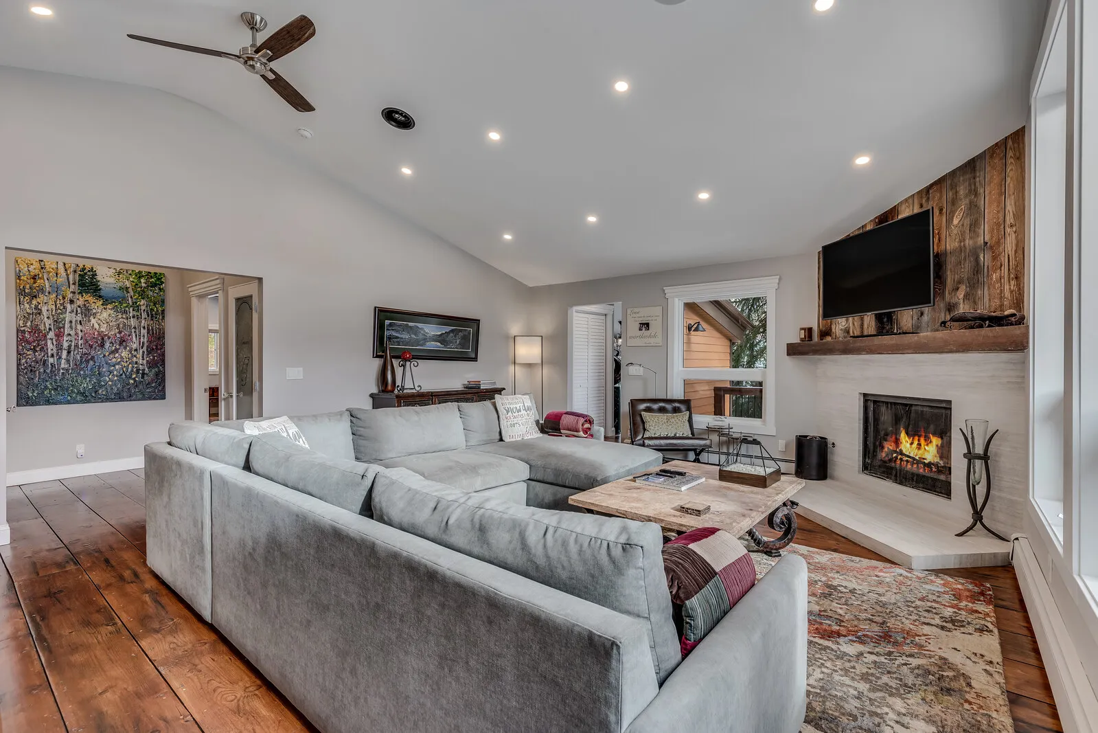 Great room, fireplace lit
