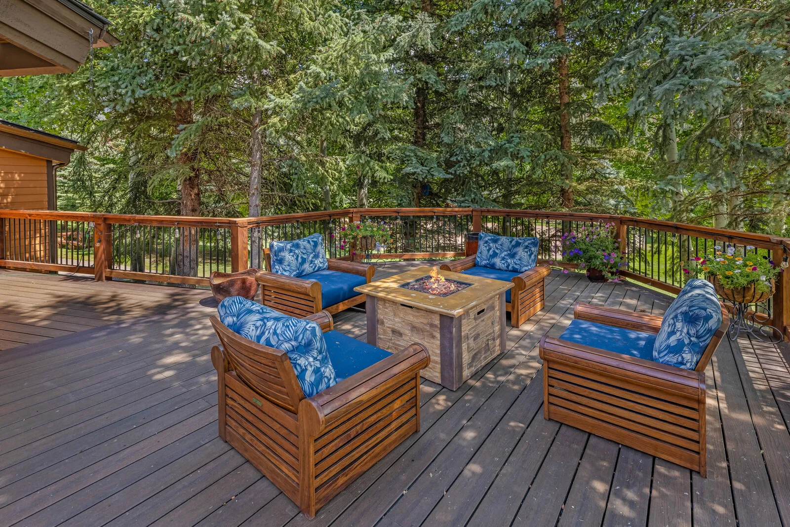 Deck fire table under the pines