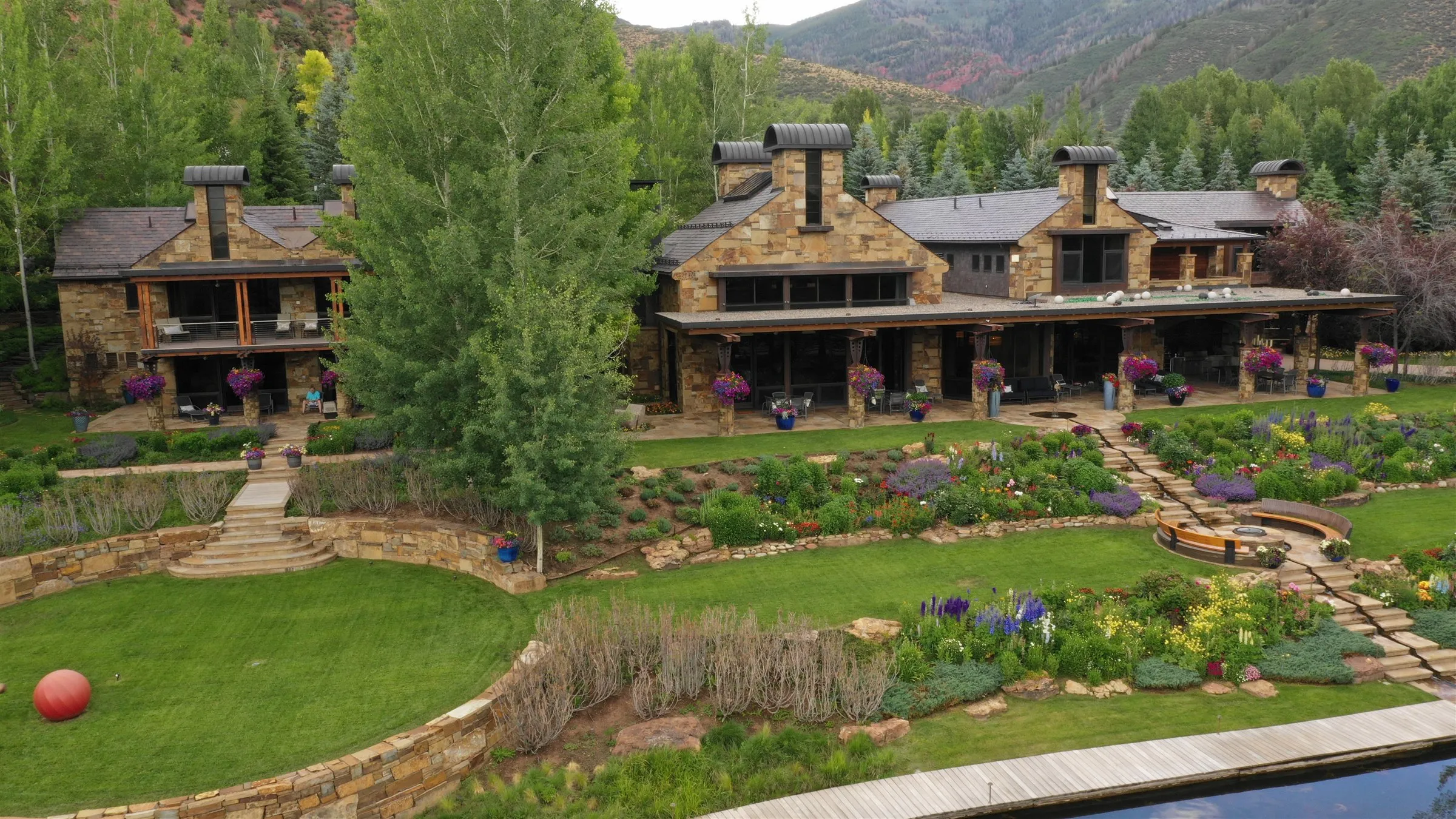 Gardens and the main house over the pond