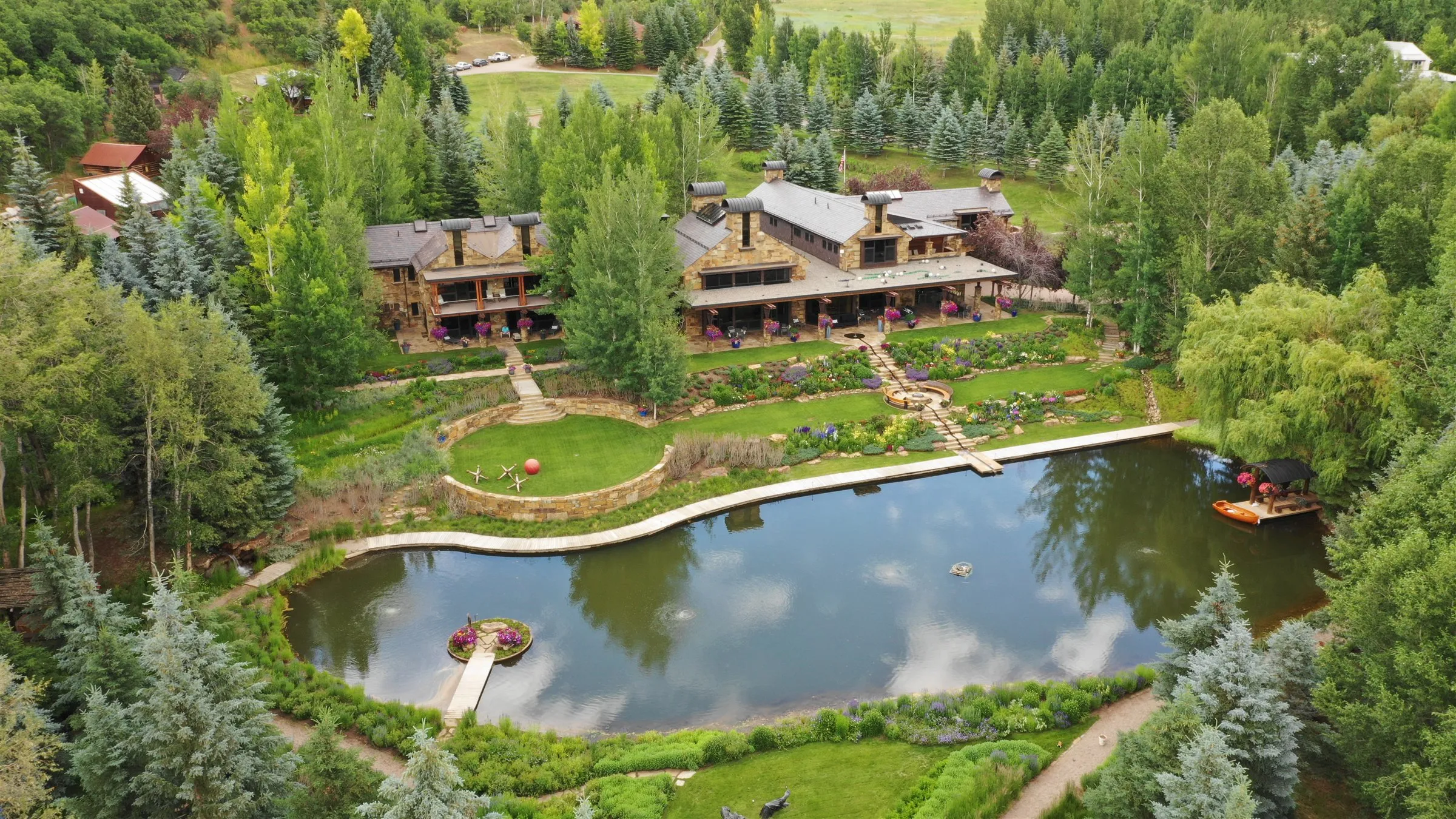 Fox Pond, the gardens and the main house from above